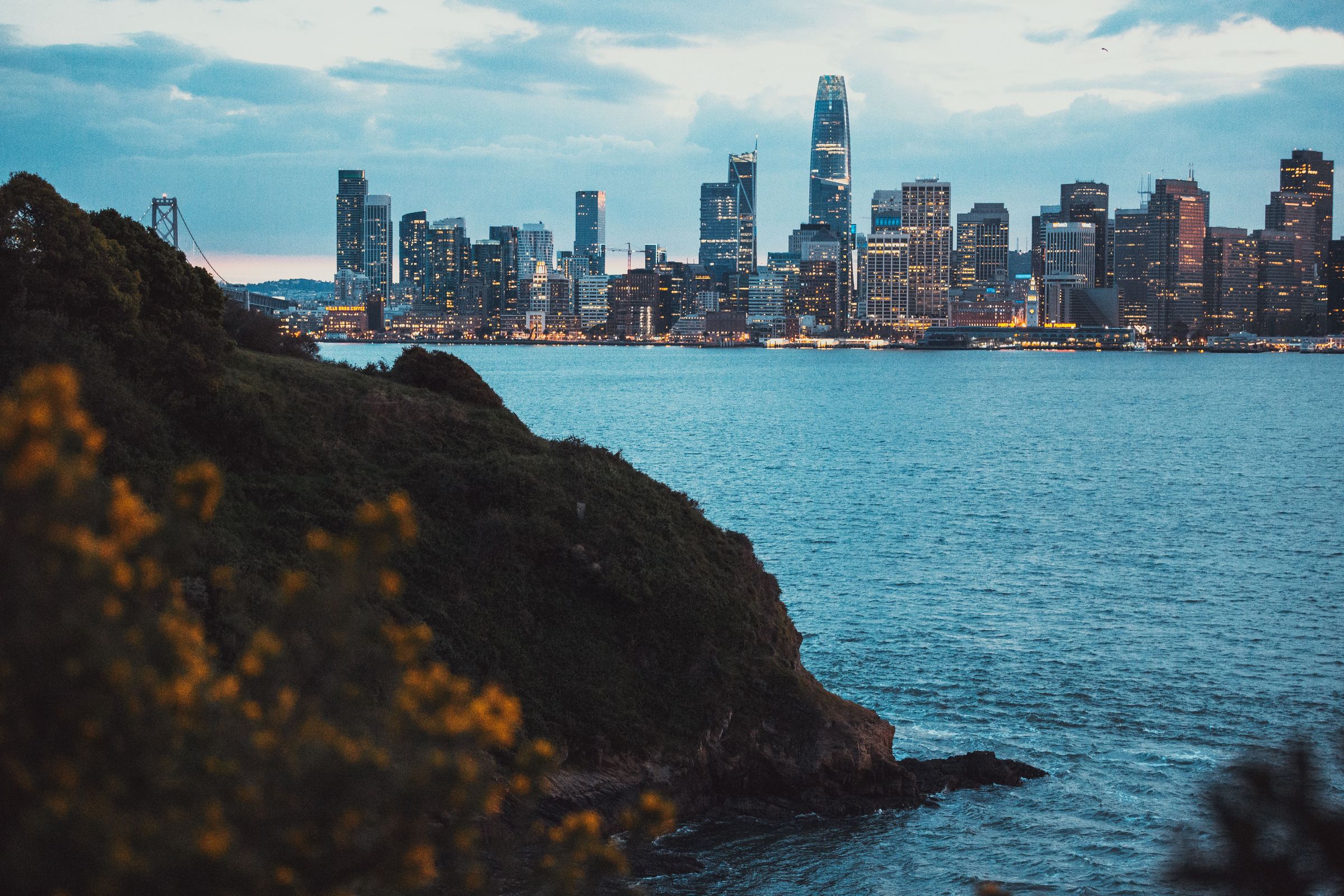 San Francisco skyline at dusk seen across the Bay from Yerba Buena Island